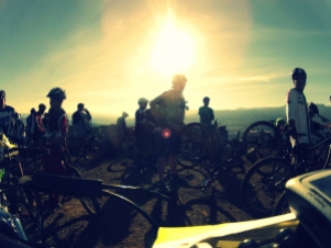 Riders assembling in the morning light to begin the first run down.